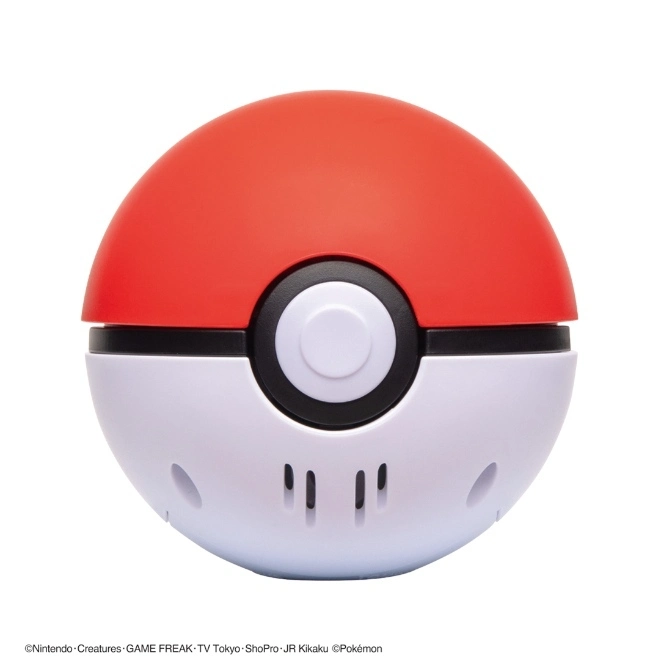  Red and white Poké Ball toy with a button in the center.