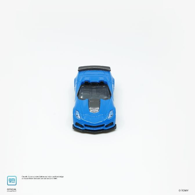  Blue toy Corvette with black accents and spoiler, facing forward.