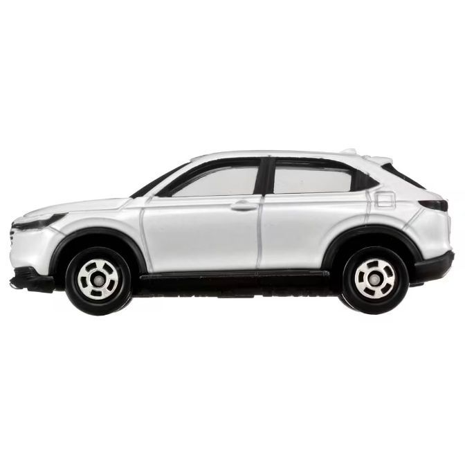  White toy car with black wheels, a miniature vehicle.