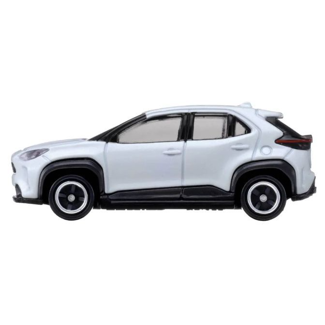  White toy car with black trim and wheels, side view.