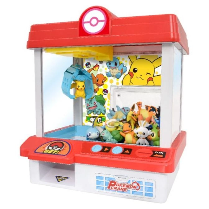 Pokémon crane game toy with Pikachu in claw, filled with plushies.